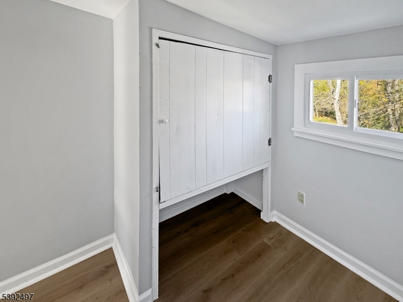 5 Orams Lane Oxford, NJ 07863 - Photo 16 of 31 a view of an empty room with wooden floor and a window