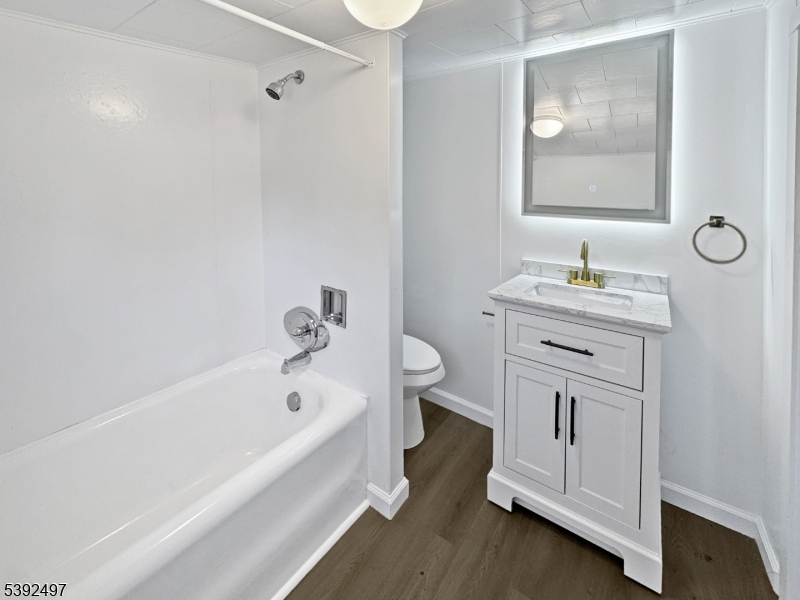 5 Orams Lane Oxford, NJ 07863 - Photo 19 of 31 a spacious bathroom with a tub sink and a mirror