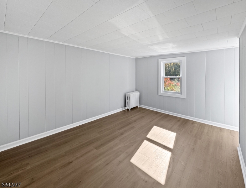 5 Orams Lane Oxford, NJ 07863 - Photo 20 of 31 an empty room with wooden floor and windows