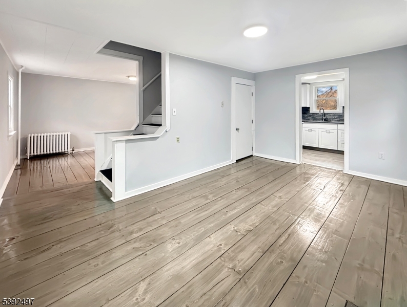 5 Orams Lane Oxford, NJ 07863 - Photo 2 of 31 wooden floor in an empty room with a window