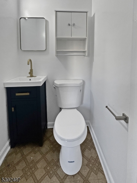 5 Orams Lane Oxford, NJ 07863 - Photo 24 of 31 a bathroom with a toilet and a sink