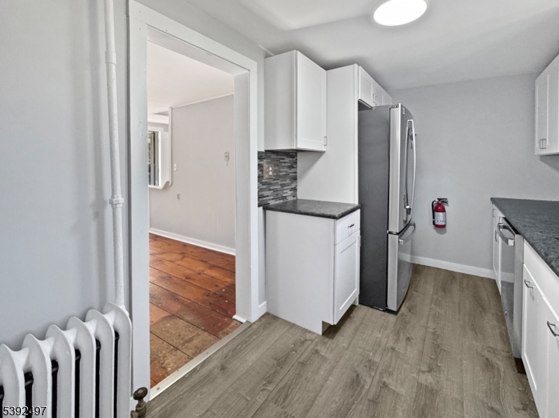 5 Orams Lane Oxford, NJ 07863 - Photo 10 of 31 a view of hallway with wooden floor