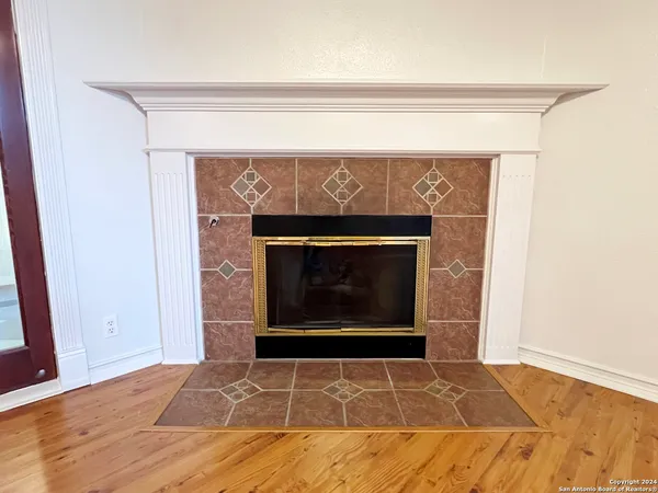 a living room with a fireplace