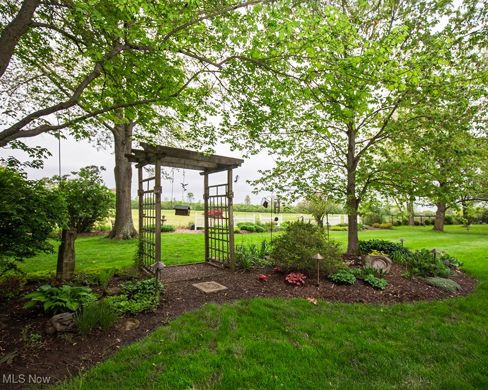 663 Beech Street Oberlin, OH 44074 - Photo 30 of 32 Lush landscaping loaded with perennials