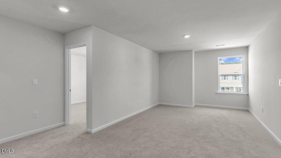 145 Westerly Way Lillington, NC 27546 - Photo 12 of 34 an empty room with windows