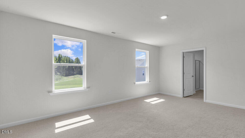 145 Westerly Way Lillington, NC 27546 - Photo 16 of 34 a view of empty room with window
