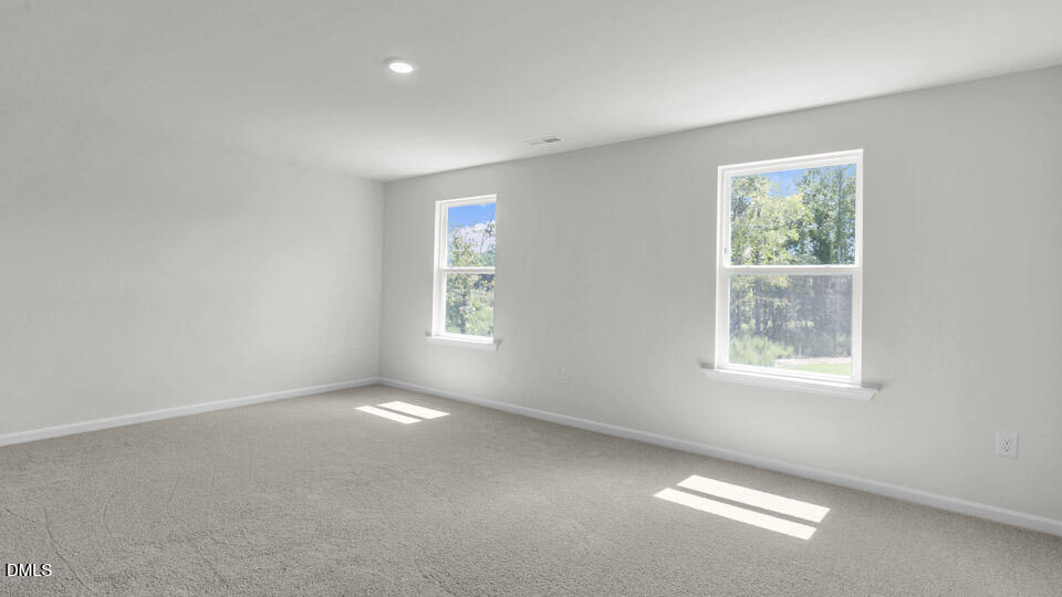145 Westerly Way Lillington, NC 27546 - Photo 17 of 34 an empty room with windows