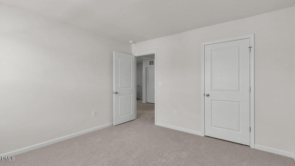 145 Westerly Way Lillington, NC 27546 - Photo 22 of 34 a view of an empty room