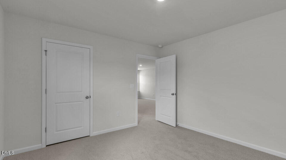 145 Westerly Way Lillington, NC 27546 - Photo 24 of 34 a view of an empty room and closet area