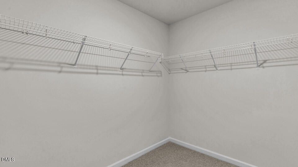 145 Westerly Way Lillington, NC 27546 - Photo 30 of 34 a view of a room with racks on the wall