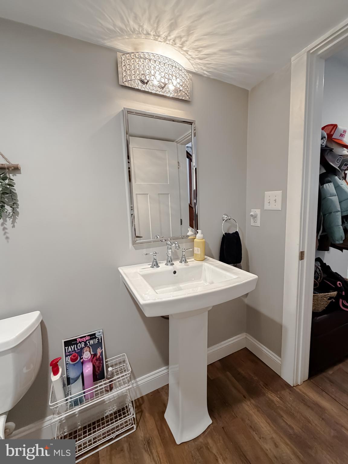 16146 Thomas Road Piney Point, MD 20674 - Photo 11 of 57 a bathroom with a sink toilet and a mirror
