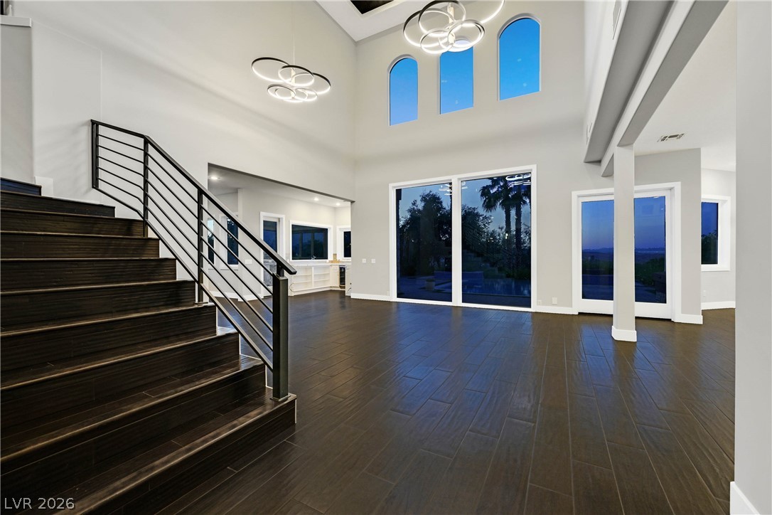 6 Rue Du Ville Henderson, NV 89011 - Photo 32 of 99 Enter into a grand living space featuring soaring ceilings and sleek design.