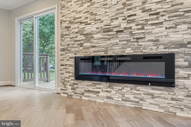 a living room with a fireplace