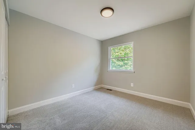 an empty room with window