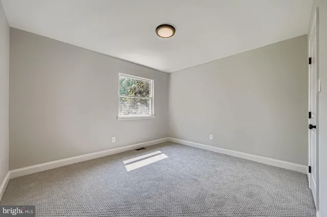 an empty room with a workbench
