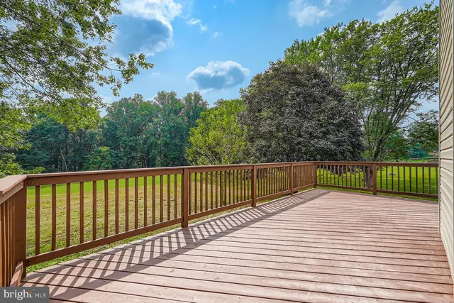 a house that has a tree in front of it