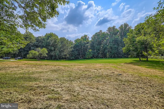 front view of a house with a street