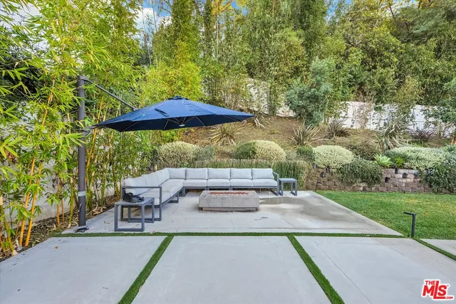 a house view with a garden space