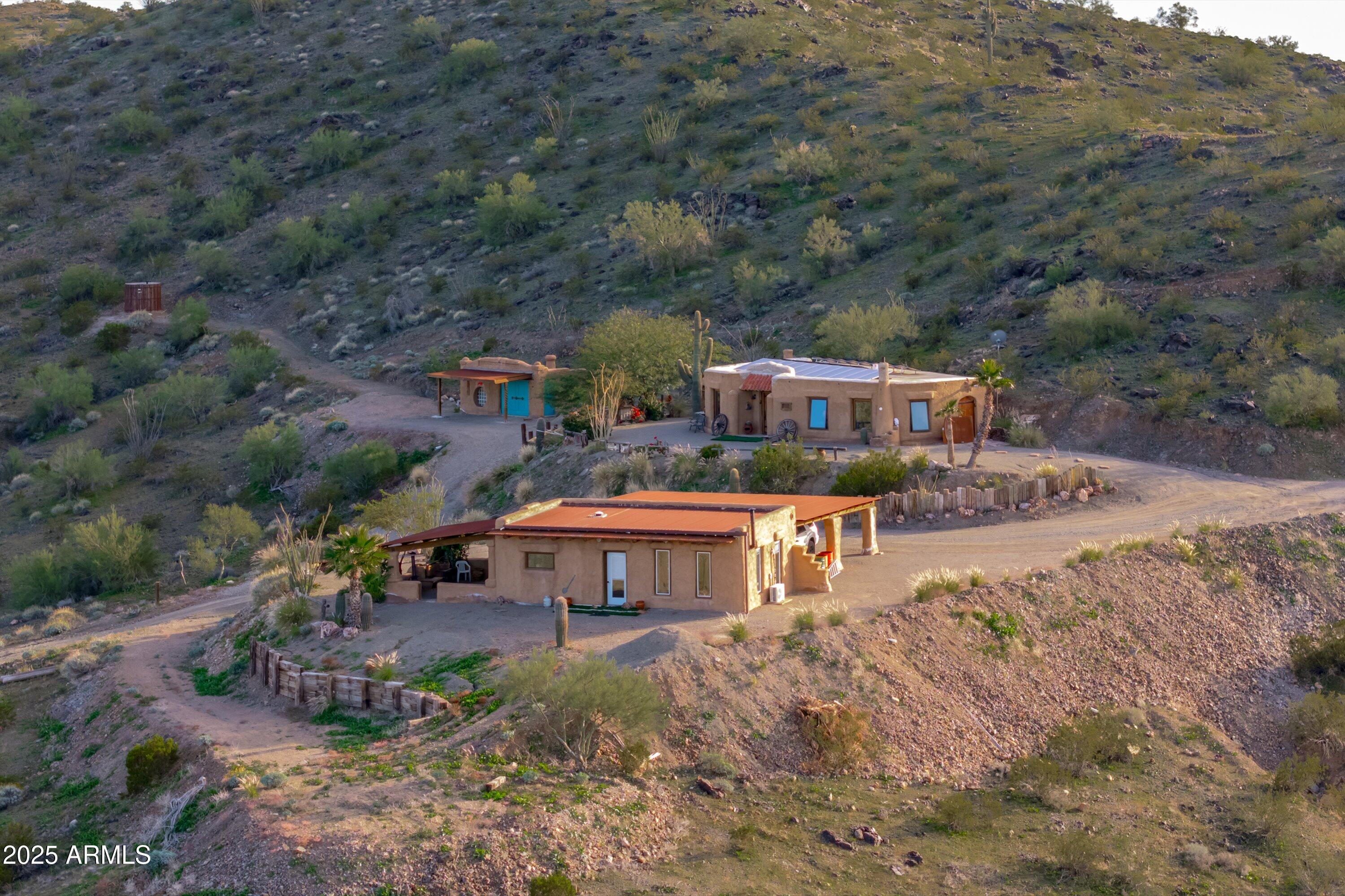 69182 North Centennial Park Road Salome, AZ 85348 - Photo 11 of 91 an aerial view of a house with a yard basket ball court and outdoor seating