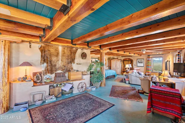 a bathroom with a sink vanity granite shower and a mirror