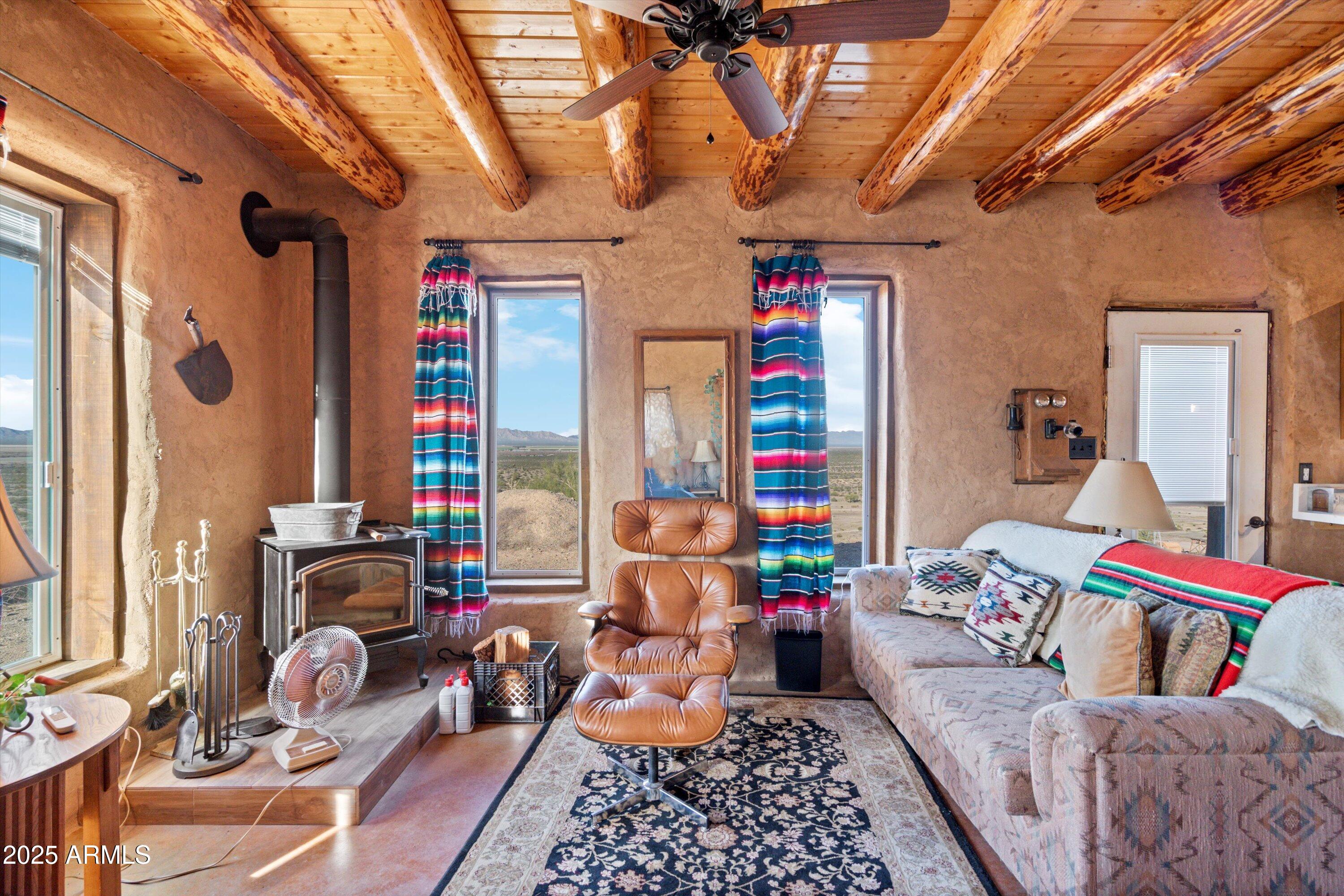 69182 North Centennial Park Road Salome, AZ 85348 - Photo 44 of 91 a living room with furniture and a chandelier