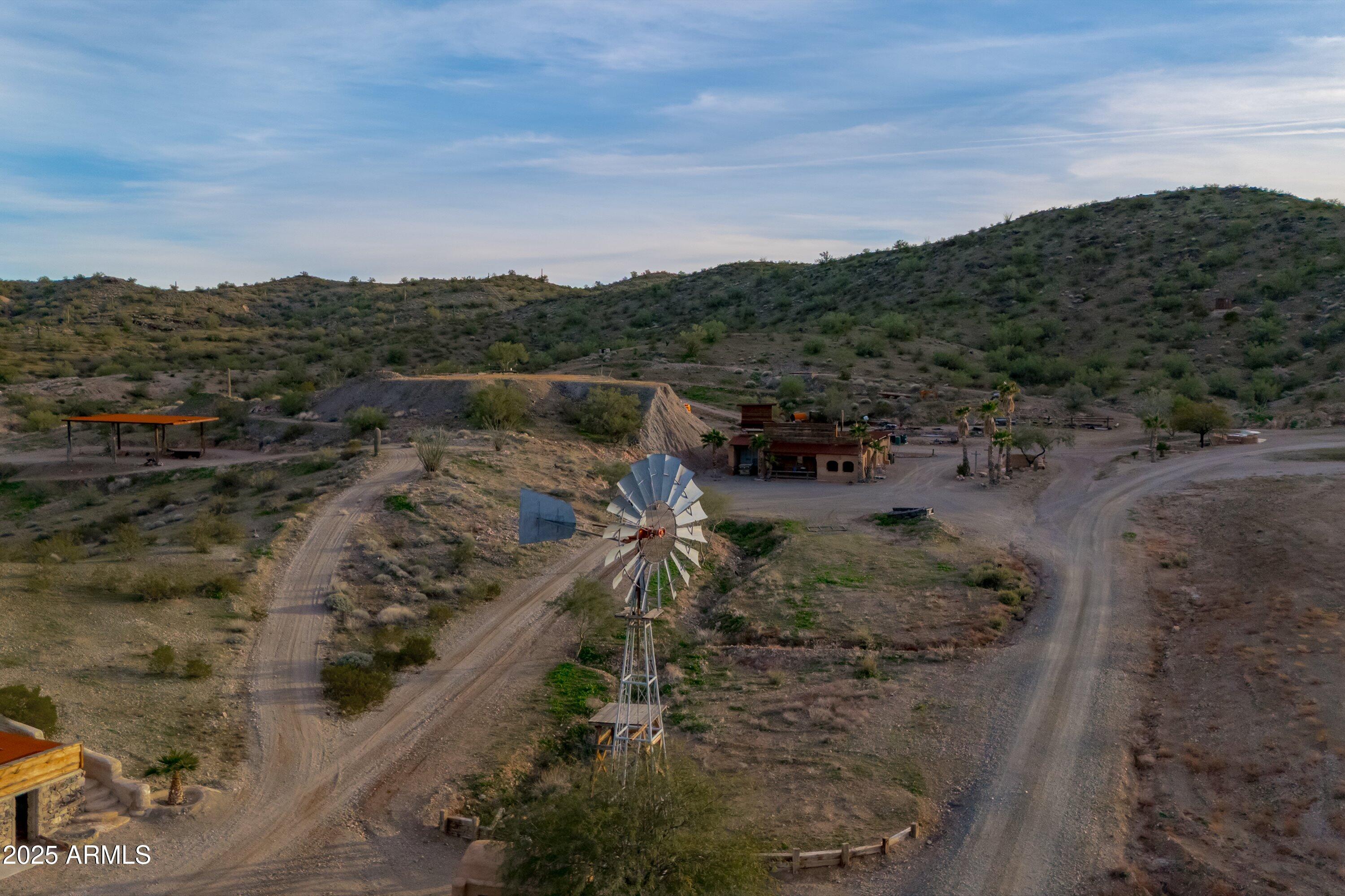 69182 North Centennial Park Road Salome, AZ 85348 - Photo 68 of 91 a view of a dry yard with wooden fence