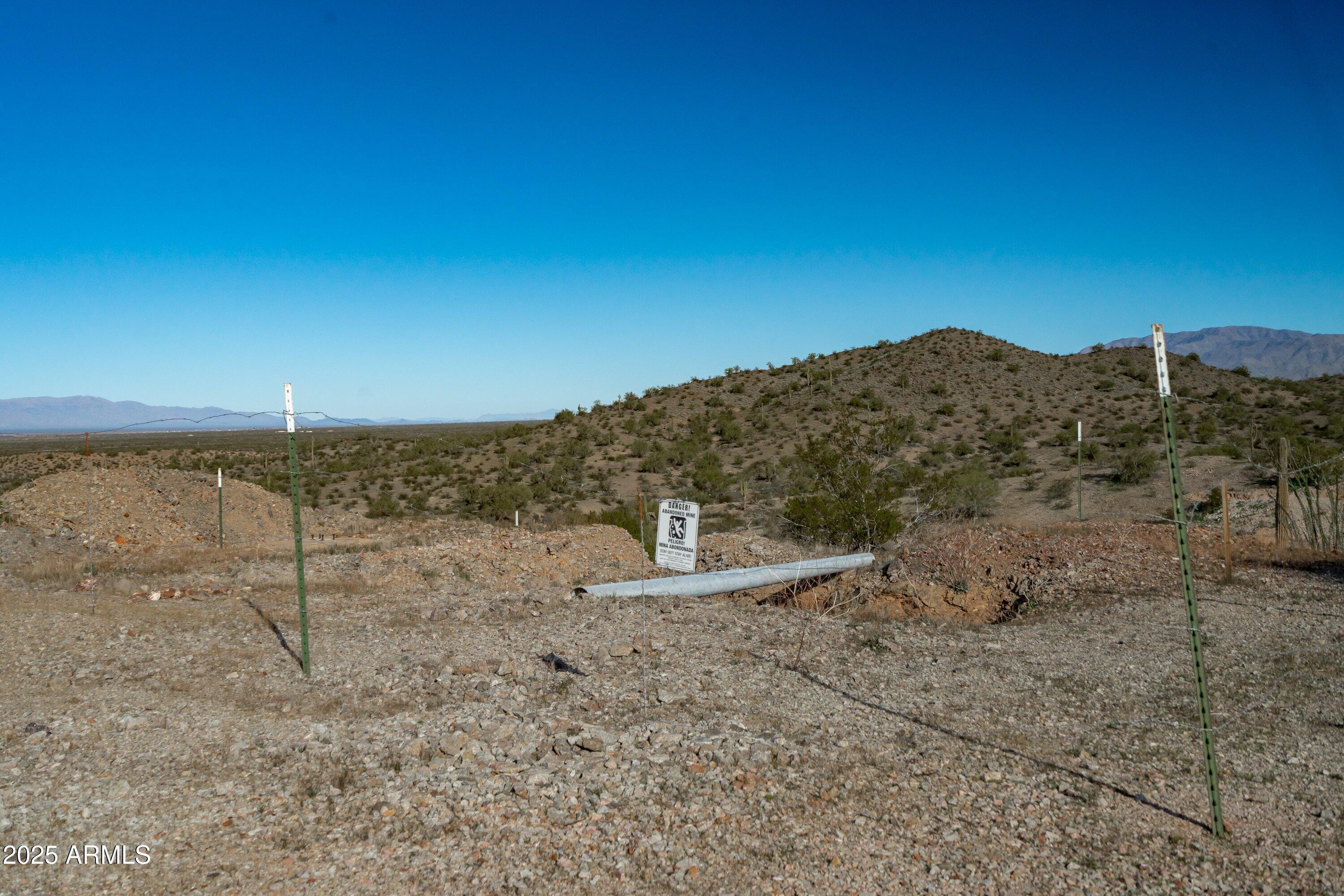 69182 North Centennial Park Road Salome, AZ 85348 - Photo 76 of 91 a view of a dry yard with wooden fence