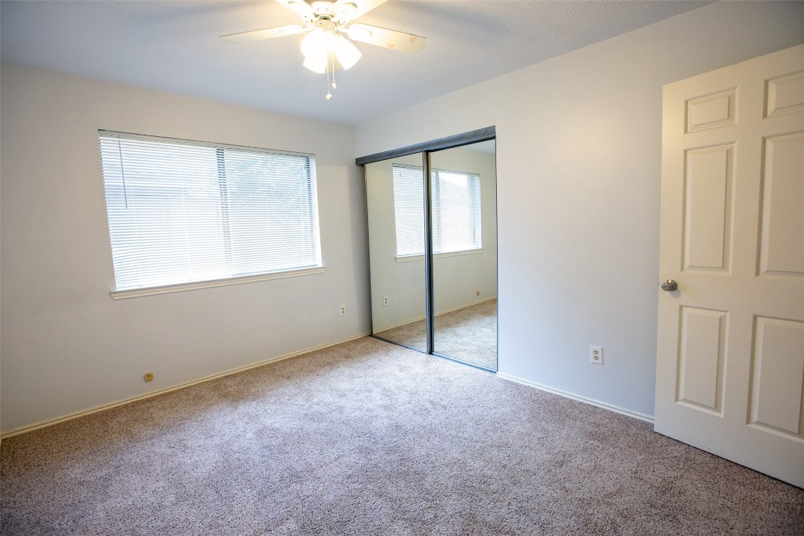 415 Abbott Circle Sugar Land, TX 77498 - Photo 11 of 19 Bedroom 1 with ample storage space and lots of light!