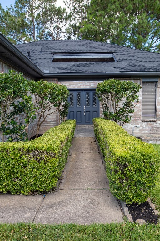 415 Abbott Circle Sugar Land, TX 77498 - Photo 6 of 19 Entry patio and double doors await you.