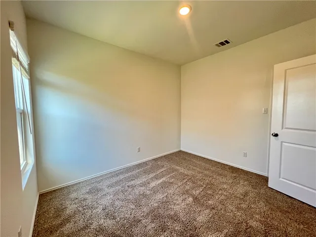 a kitchen with a refrigerator sink and microwave