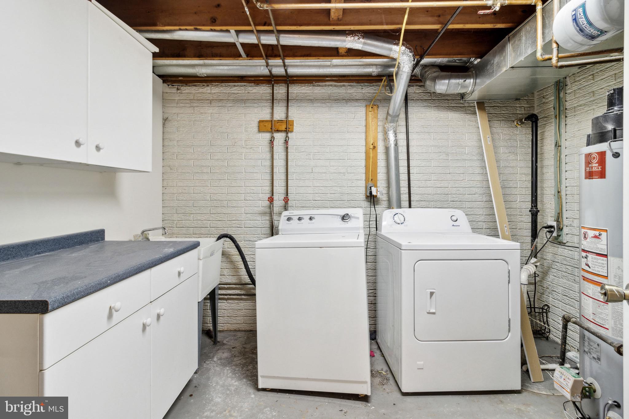 305 Hammershire Road Owings Mills, MD 21117 - Photo 27 of 31 Laundry room & Storage