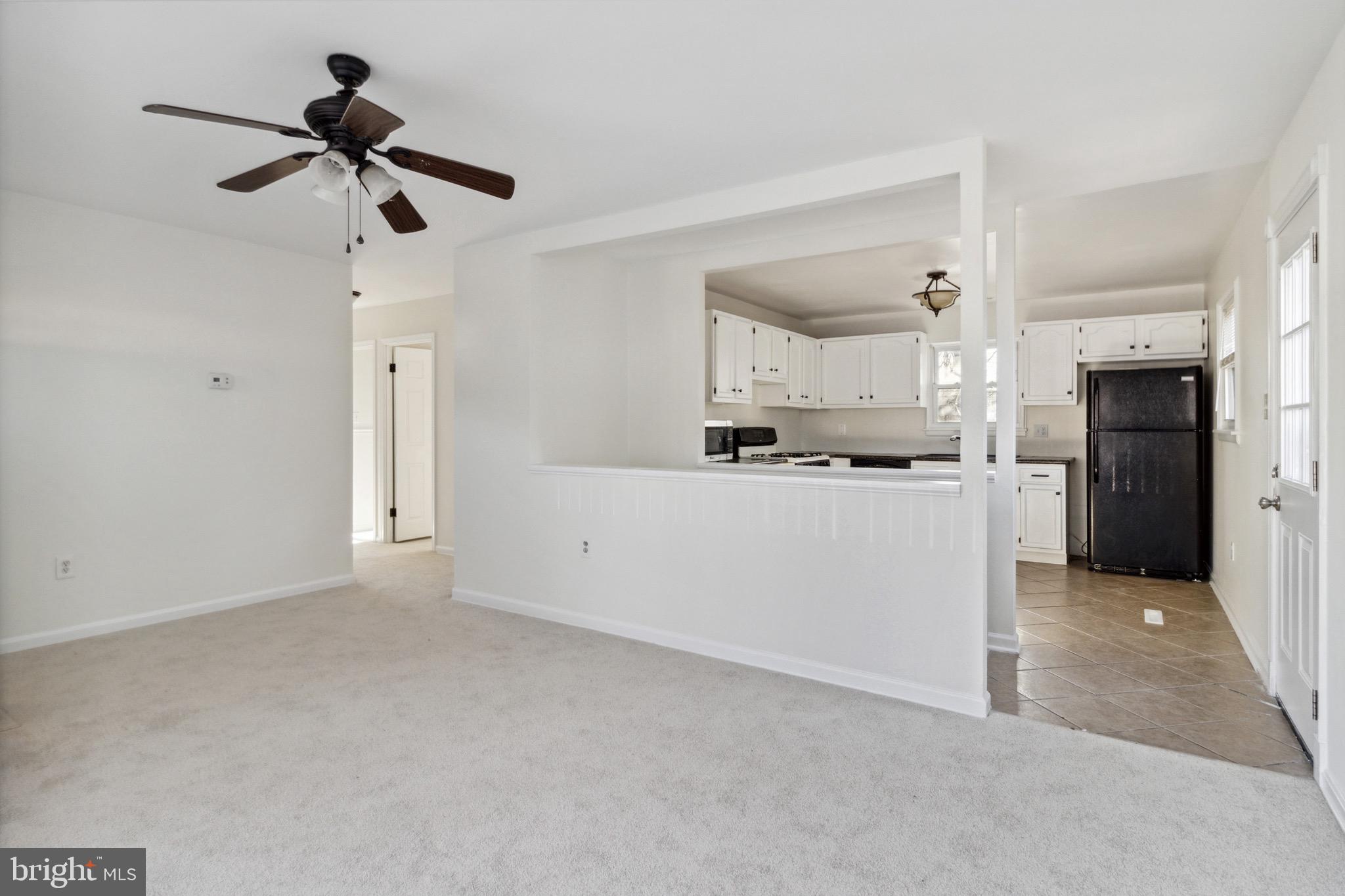 305 Hammershire Road Owings Mills, MD 21117 - Photo 5 of 31 Living Room Adjacent to Kitchen