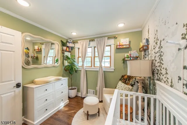 a spacious bathroom with a double vanity sink a mirror a bathtub and a shower