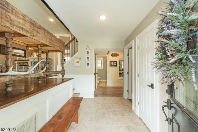 a view of a bathroom with a tub and shower