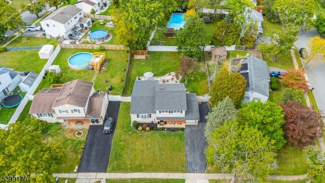 an aerial view of a house with a garden