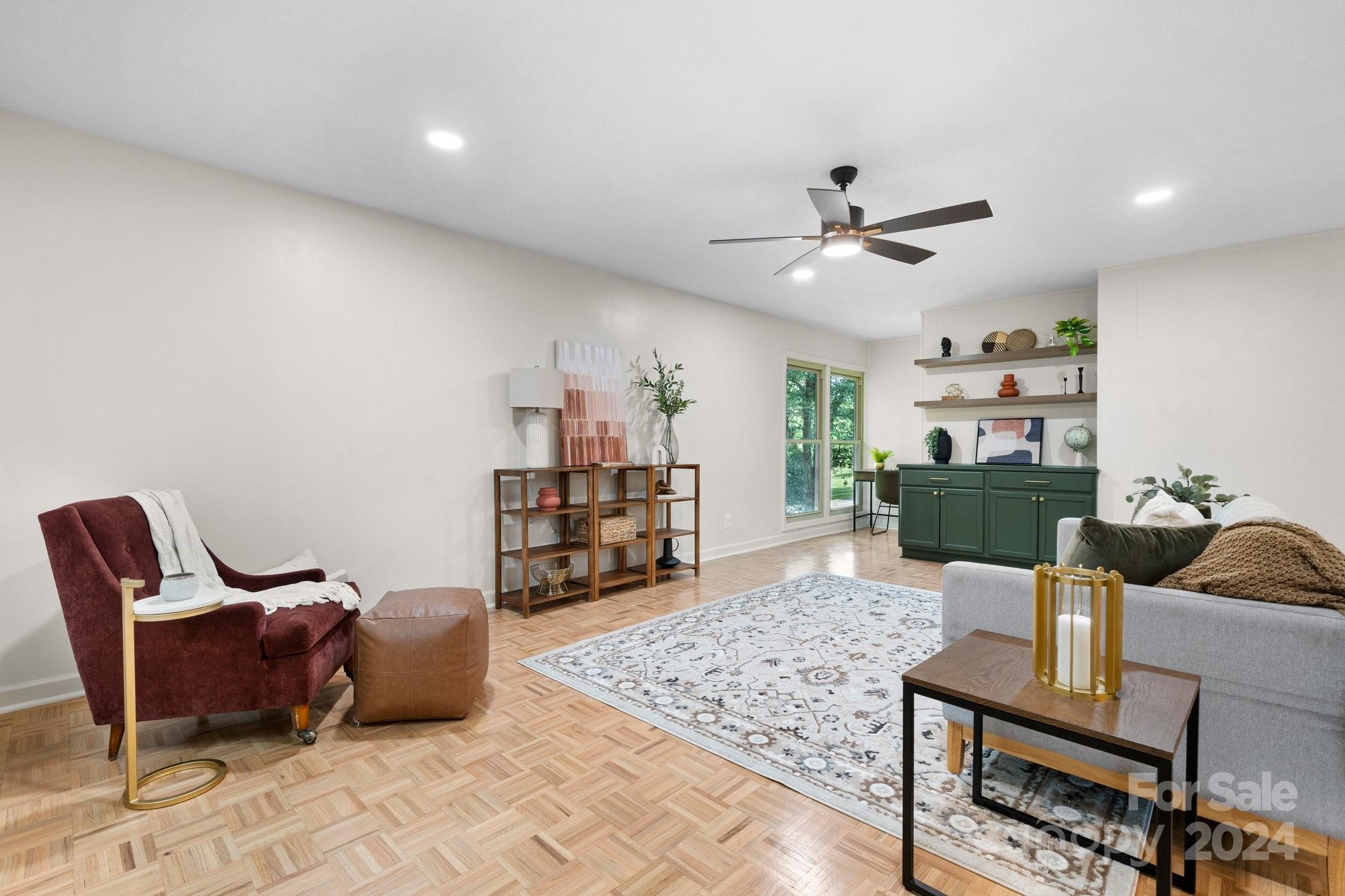 215 Blanton Road Morganton, NC 28655 - Photo 14 of 40 a living room with furniture and a rug