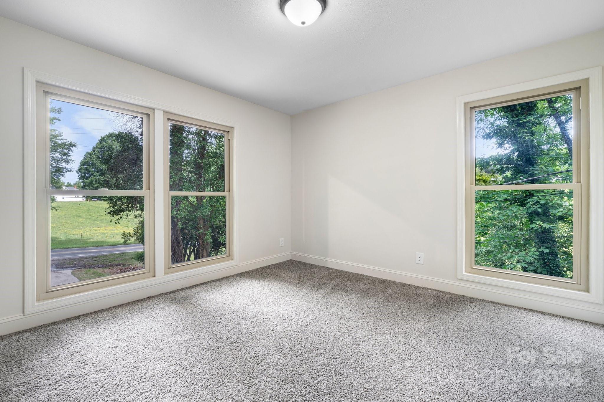 215 Blanton Road Morganton, NC 28655 - Photo 20 of 40 a view of a room that has a window in it
