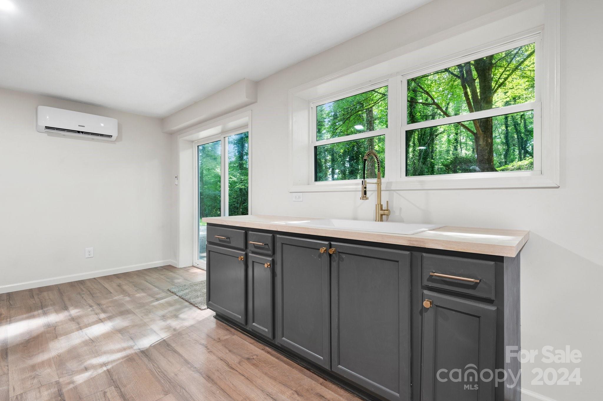 215 Blanton Road Morganton, NC 28655 - Photo 26 of 40 a kitchen with a sink and large window