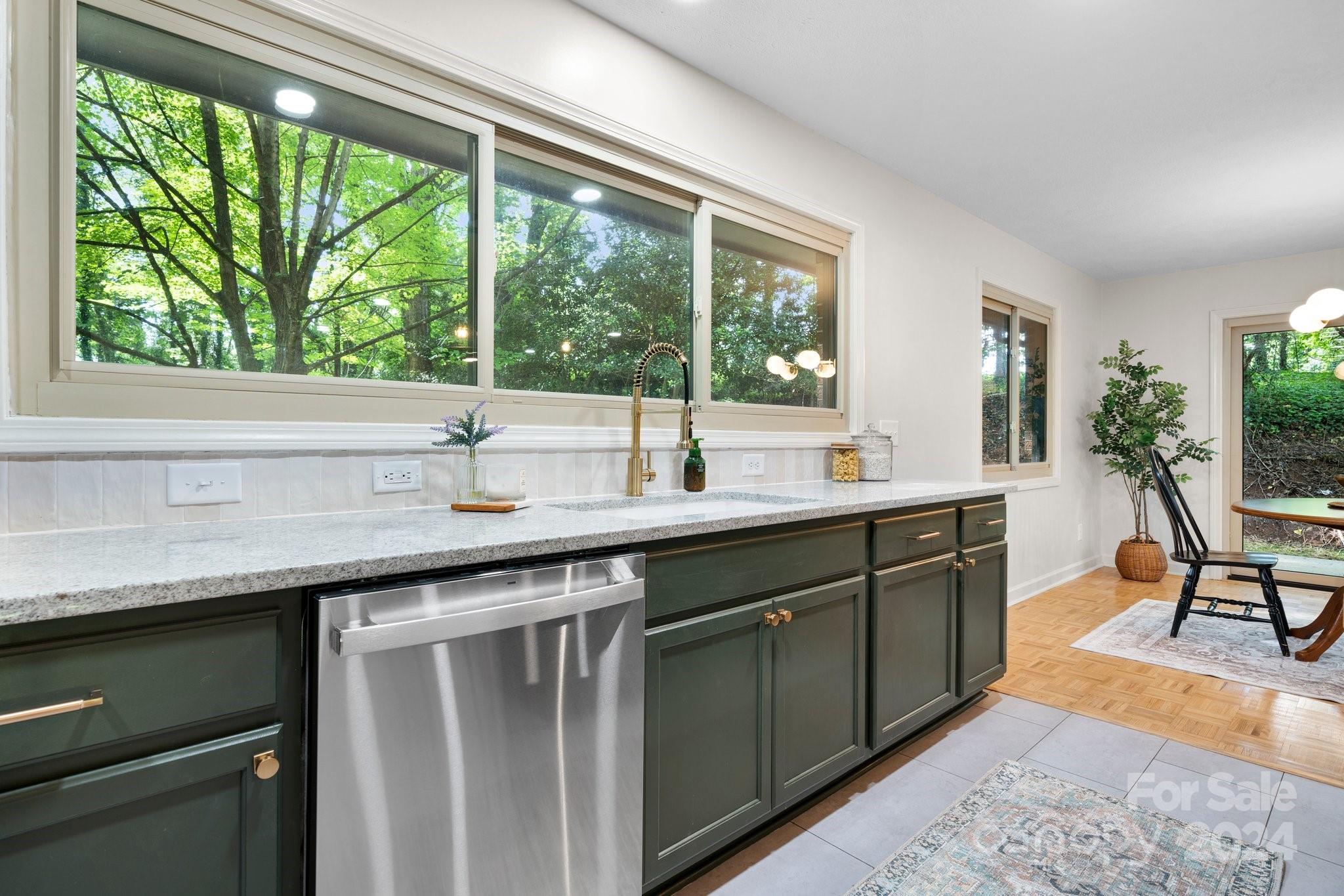 215 Blanton Road Morganton, NC 28655 - Photo 10 of 40 a kitchen with a sink and large window