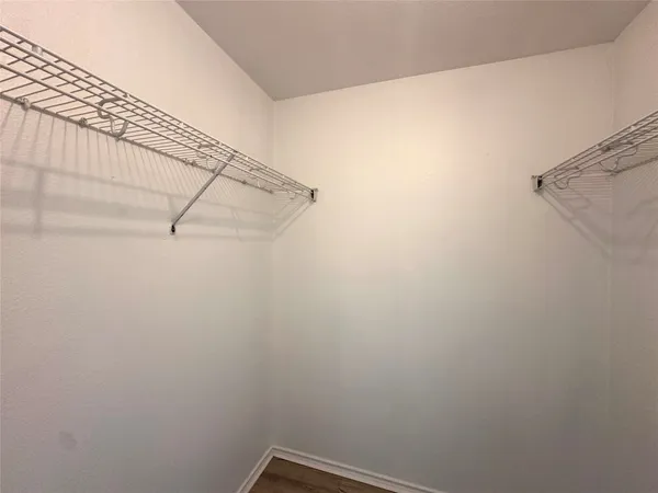 a view of a room with racks on the wall