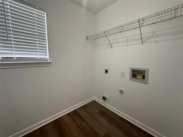 a view of a small space with racks on the wall