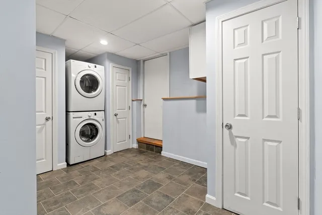 a view of a storage and utility room with washer and dryer