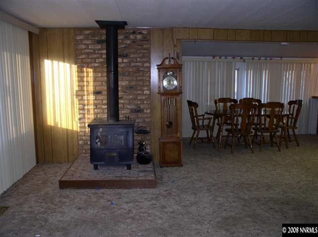 225 Aries Circle Reno, NV 89521 - Photo 4 of 9 a dining room with furniture and window