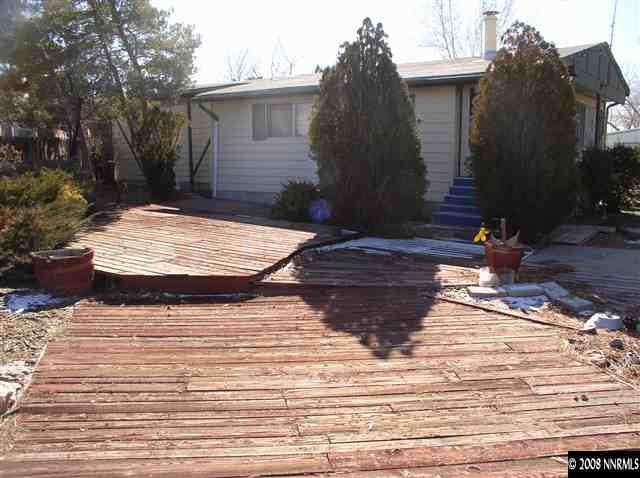 225 Aries Circle Reno, NV 89521 - Photo 8 of 9 a view of a backyard of the house