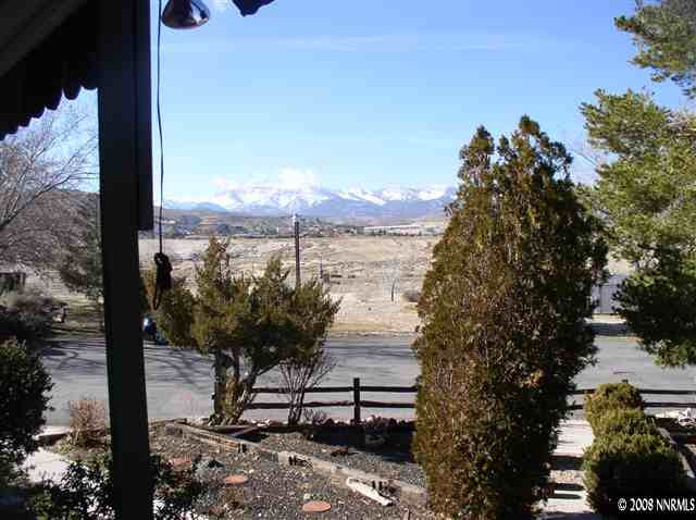 225 Aries Circle Reno, NV 89521 - Photo 9 of 9 a view of a lake from a balcony