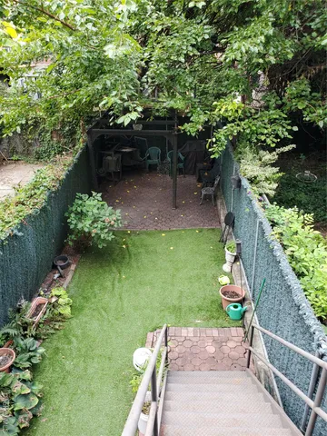 a view of yard with seating area