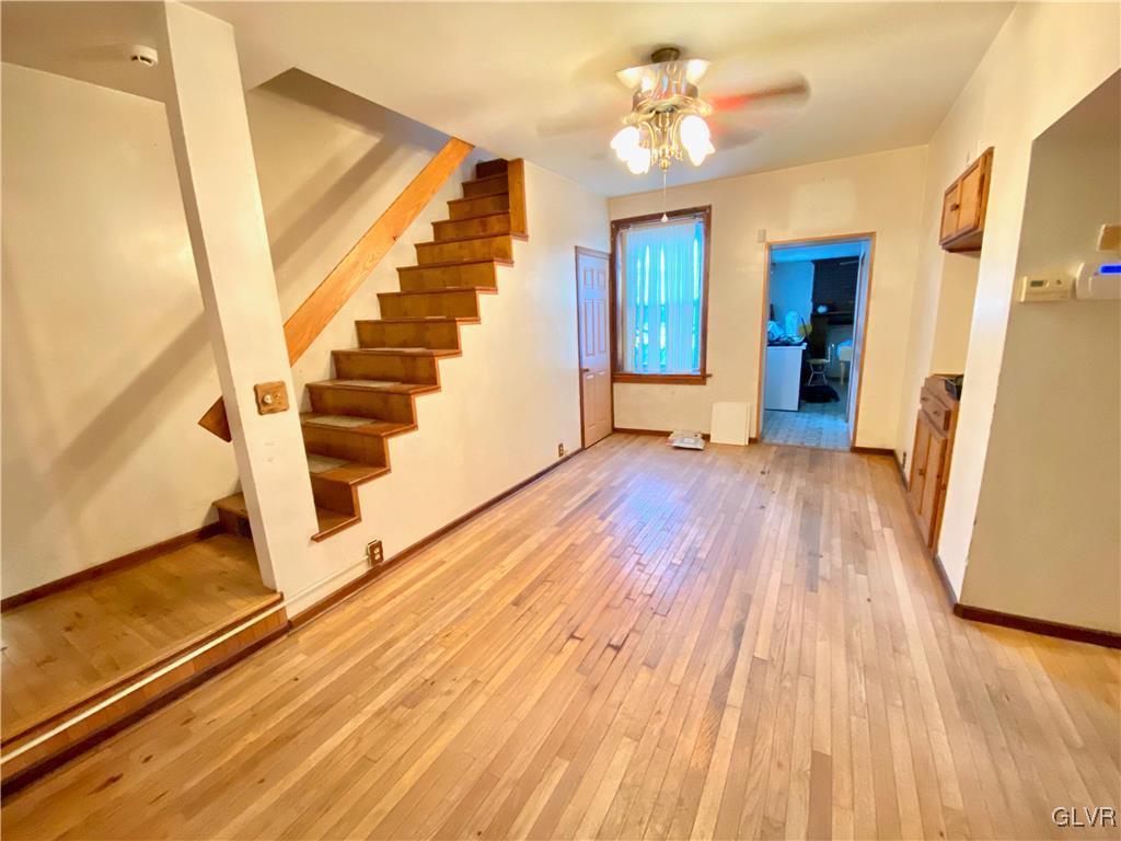 682 Washington Boulevard Bangor, PA 18013 - Photo 12 of 21 a view of a room with wooden floor and staircase