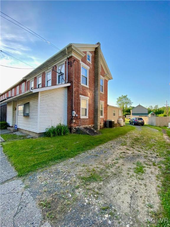 682 Washington Boulevard Bangor, PA 18013 - Photo 2 of 21 a front view of a house with a yard