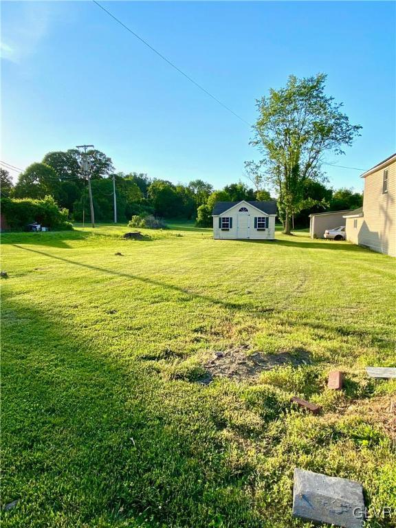 682 Washington Boulevard Bangor, PA 18013 - Photo 3 of 21 a view of a swimming pool and a yard