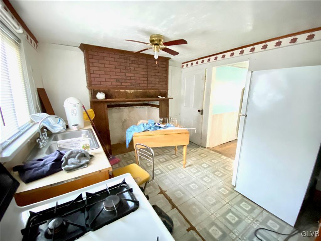 682 Washington Boulevard Bangor, PA 18013 - Photo 9 of 21 a living room with a couch and a table